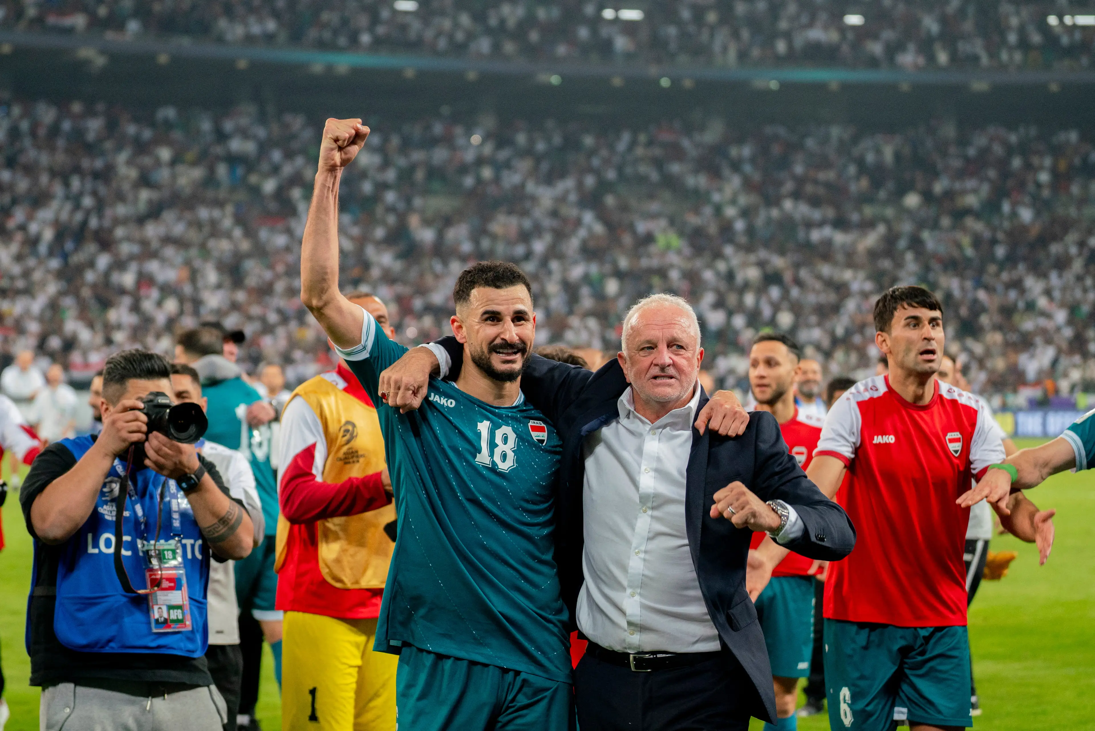 Iraq manager Graham Arnold (right) has called on FIFA to delay the World Cup play-offs (Image: Getty)