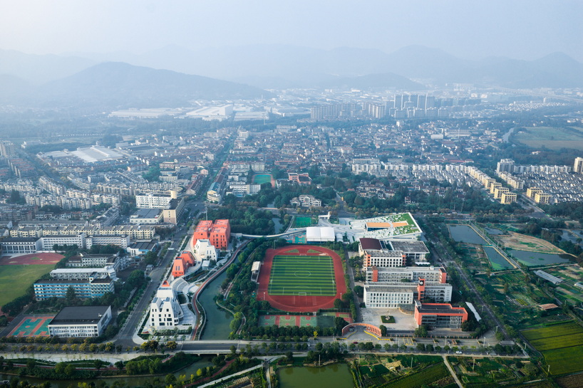 red and white geometric sports complex emerges along daixi’s riverfront - 1