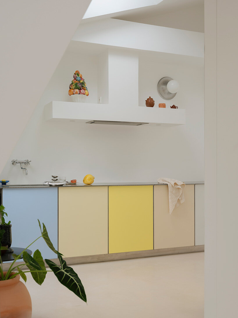 acte deux unifies parisian 'maids' rooms' into 55-square-meter attic apartment - 2