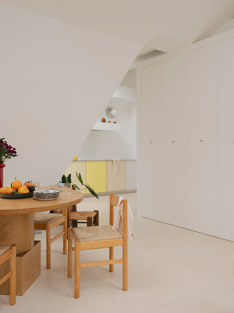 acte deux unifies parisian 'maids' rooms' into 55-square-meter attic apartment - 4