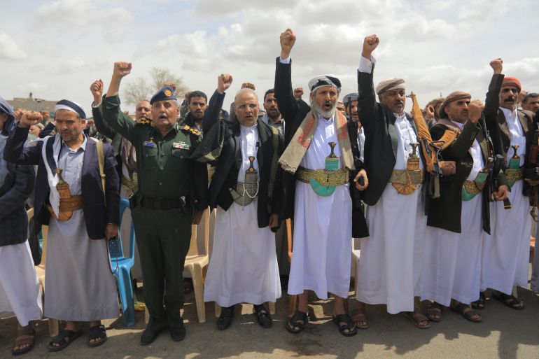 Supporters of Yemen's Huthi movement attend an event commemorating the ninth anniversary of the Saudi-led intervention in their country, in the capital Sanaa on March 26, 2026. (Photo by Mohammed HUWAIS / AFP)
