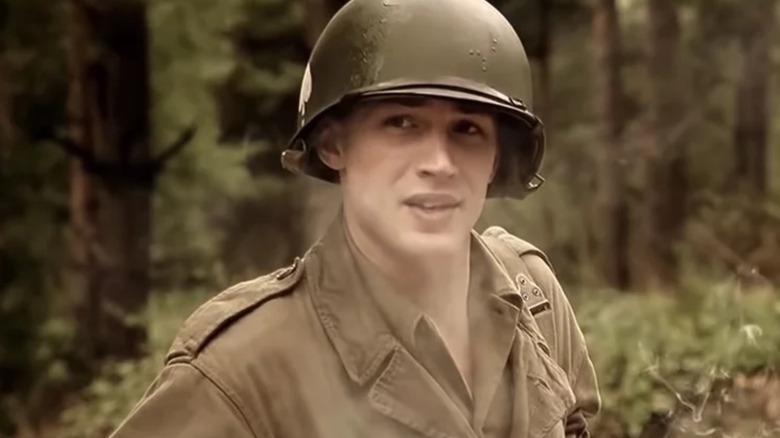 Tom Hardy as Private John A. Janovec in a soldier's uniform in Band of Brothers
