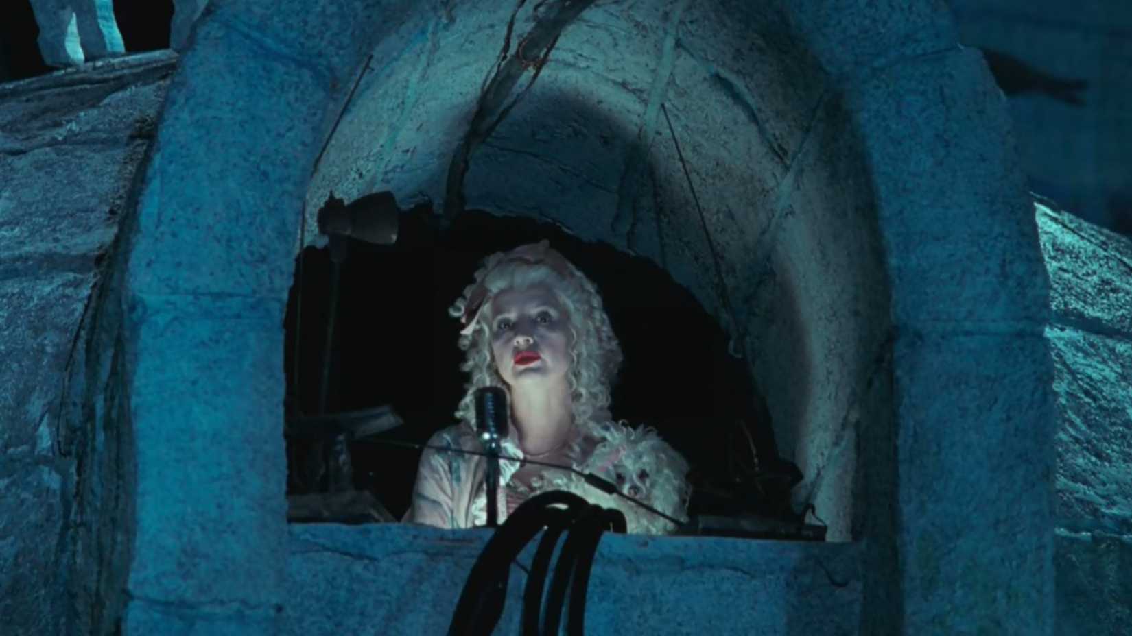 batman returns poodle lady instructing penguin on his plan