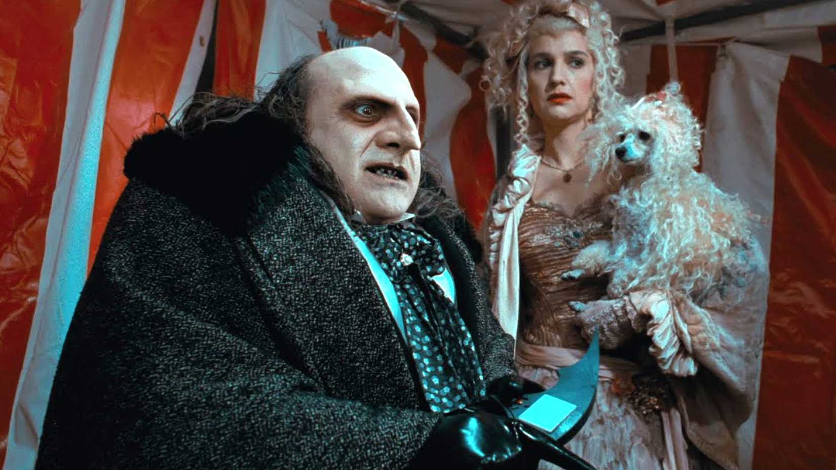 batman returns still of penguin and the poodle lady