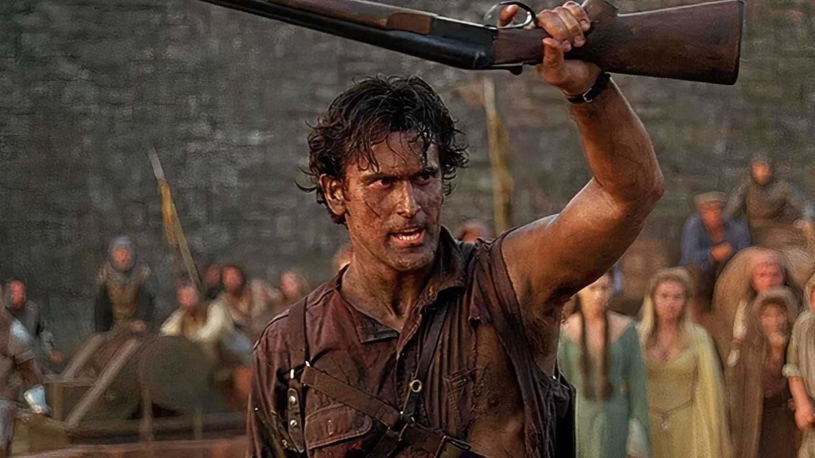 Bruce Campbell holding up a shotgun as Ash in Army of Darkness