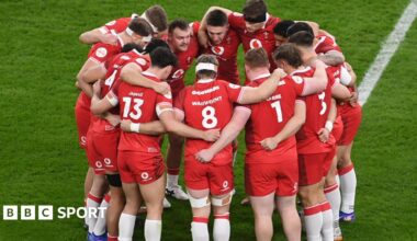 Wales players in a huddle