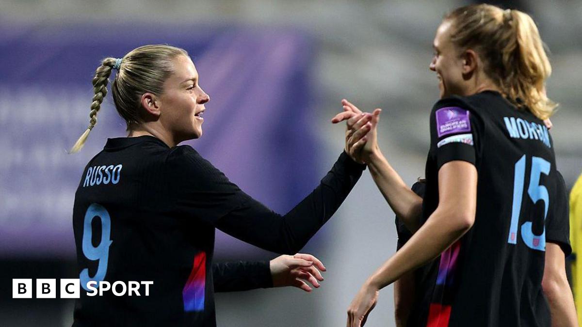 Alessia Russo celebrates scoring for England