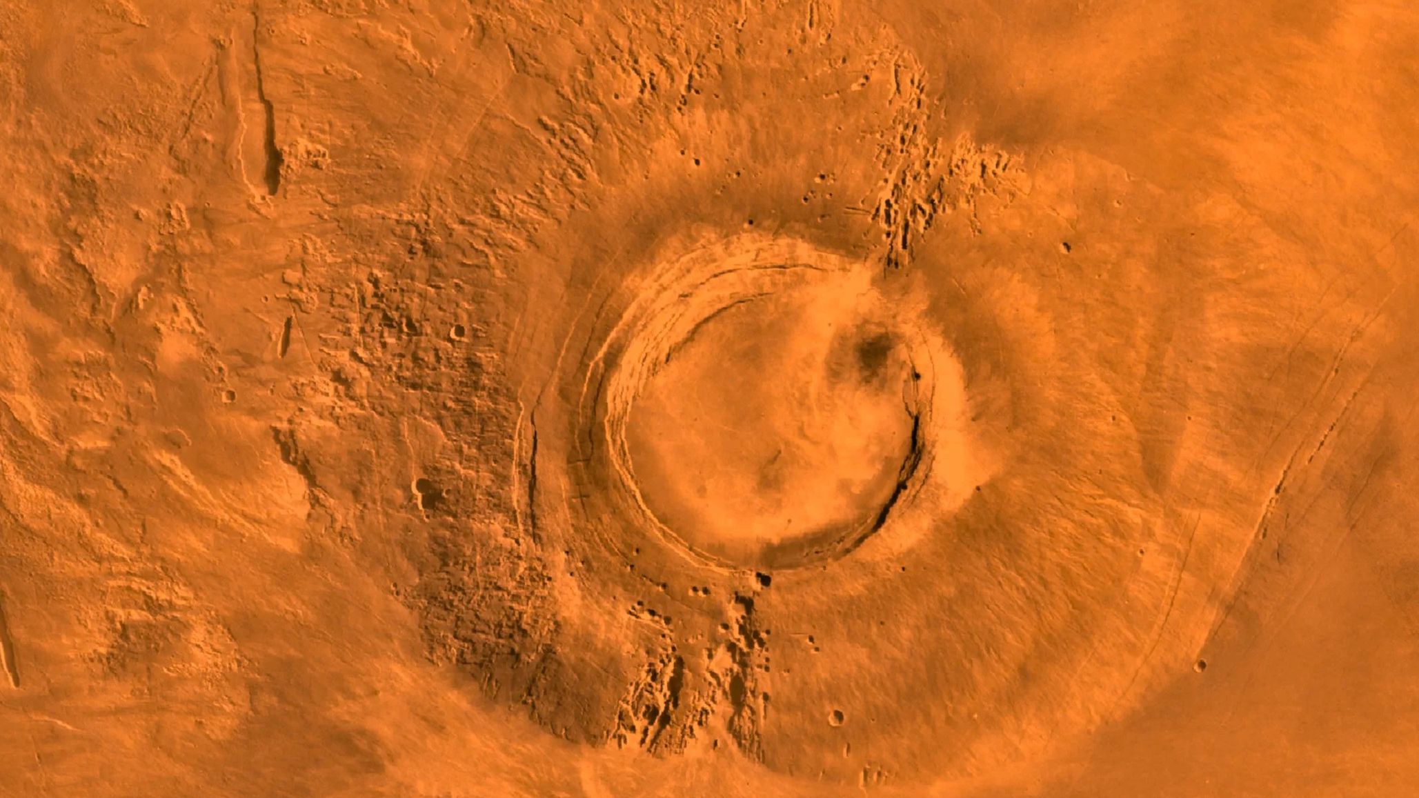 This digital-image mosaic of Mars' Tharsis plateau shows the extinct volcano Arsia Mons. It was assembled from images that the Viking 1 Orbiter took during its 1976 to 1980 working life at Mars.
