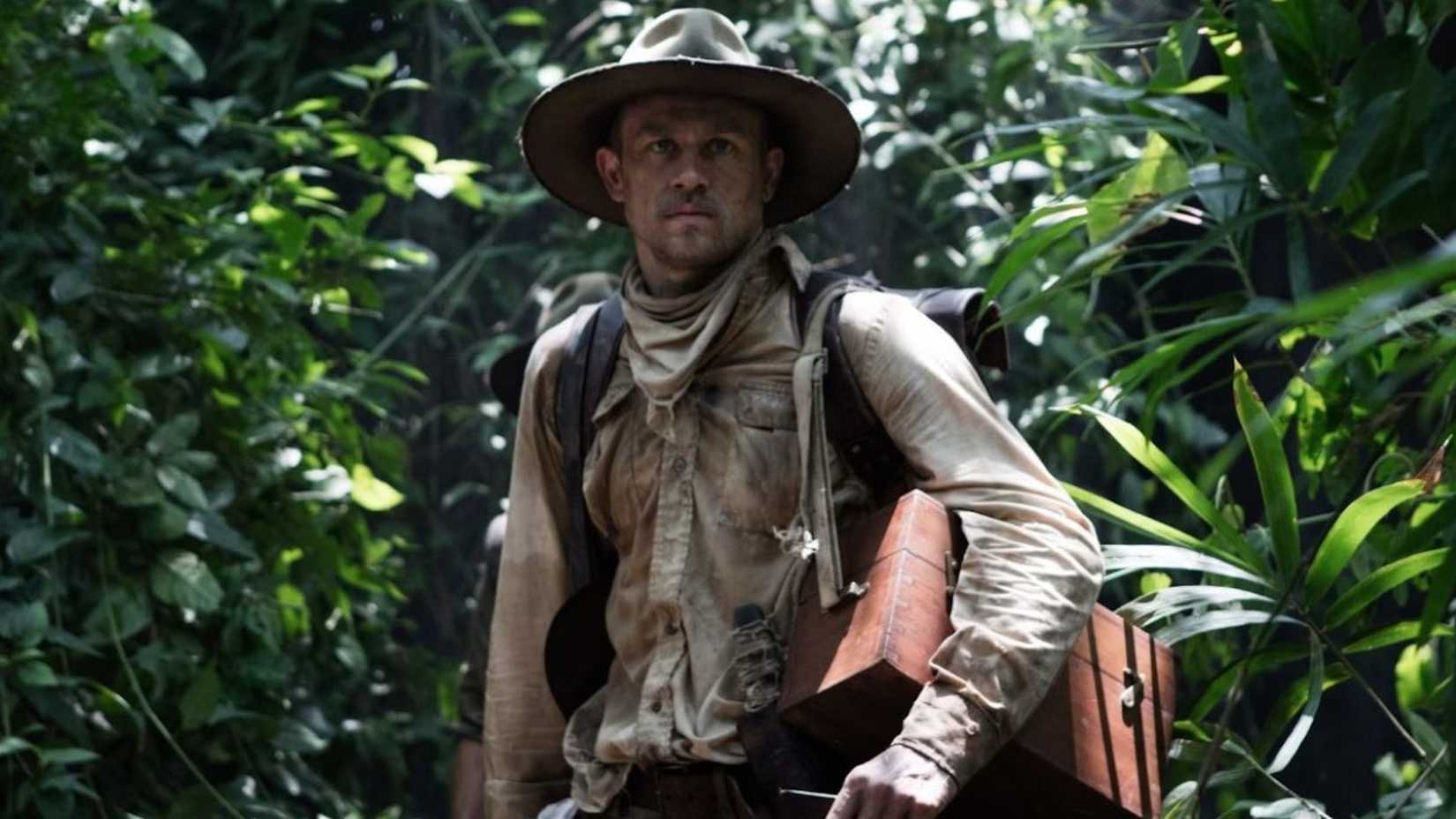 charlie hunnam as percy fawcett standing in the jungle in The Lost City of Z