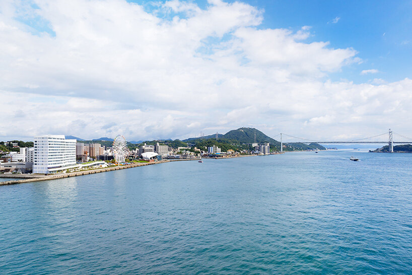 curved twin volumes shape the risonare shimonoseki hotel along japan's kanmon strait - 1