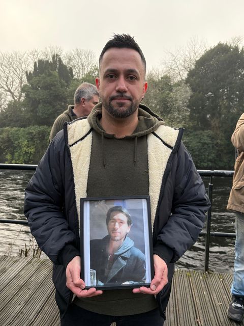 Joe Loughnane with a photo of his late brother Adam.