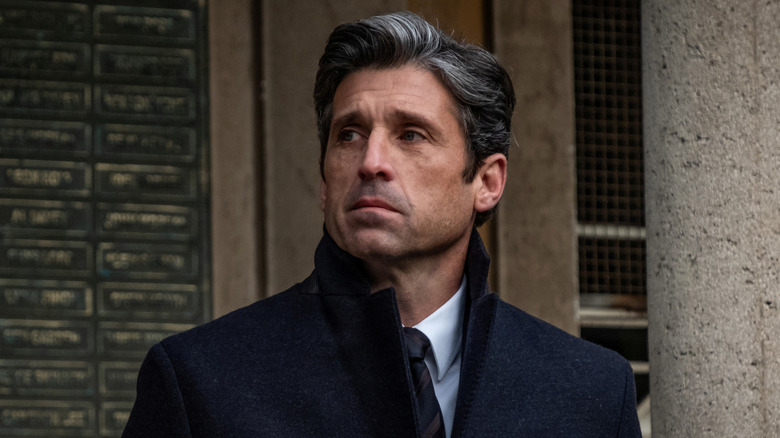 Dominic Morgan (Patrick Dempsey) standing outside in Devils