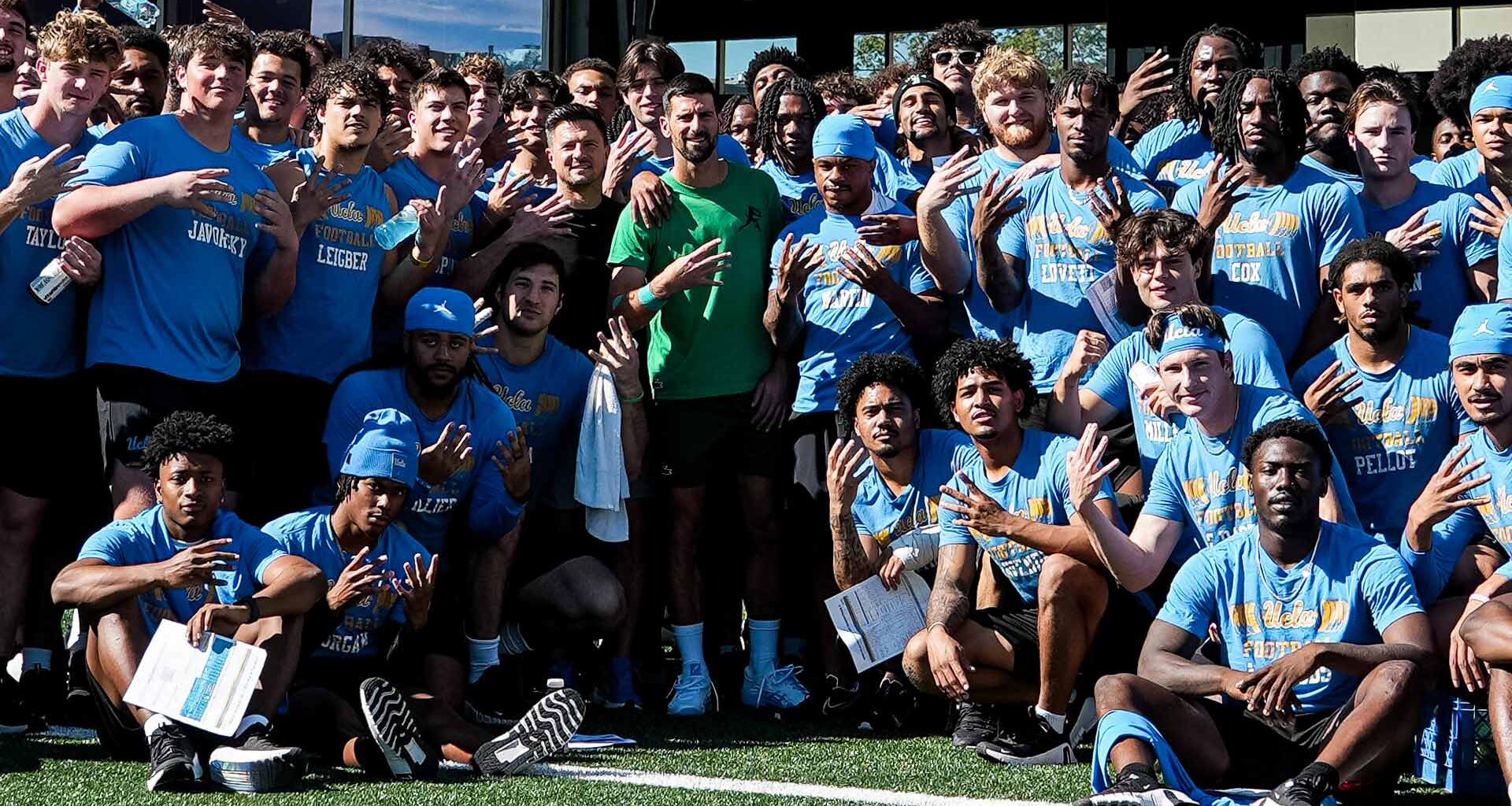 Novak Djokovic meets with the UCLA football team ahead of the BNP Paribas Open.