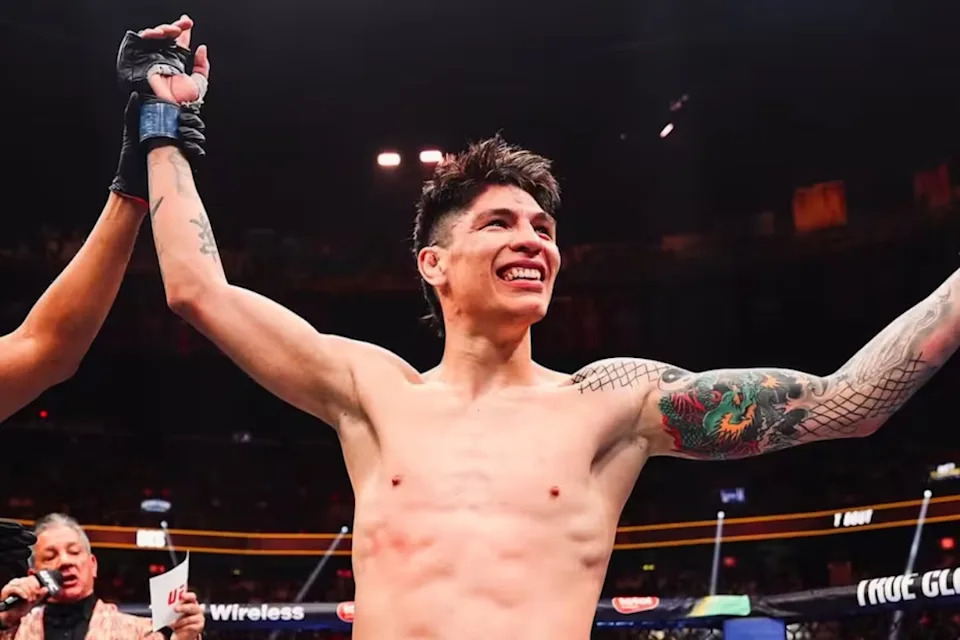 Ignacio Bahamondes has his hand raised inside the UFC Octagon following a victory.&lpar;via Zuffa LLC&rpar;