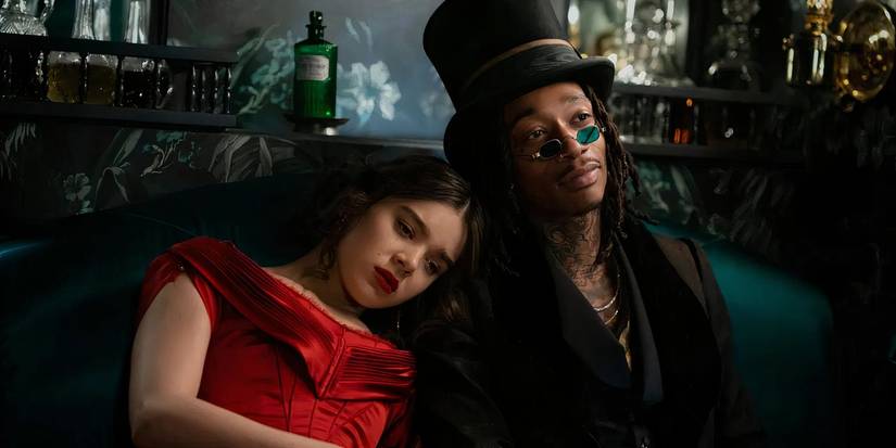 Emily Dickinson (Hailee Steinfeld) leans on Death (Wiz Kahlifa) in Dickinson season 1