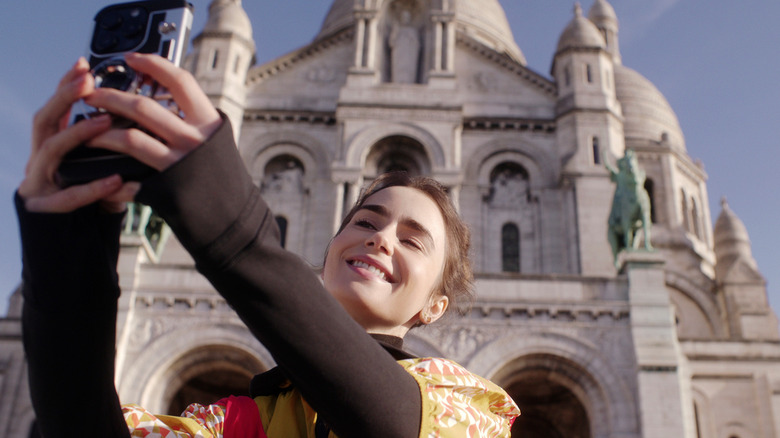 Emily taking a selfie on the steps of the Sacré-Cœur in 