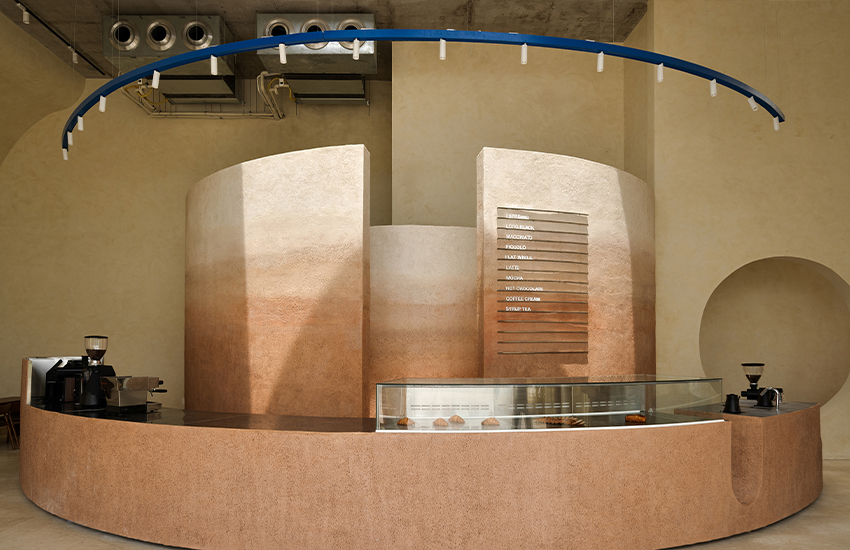 sand-hued geometric volumes of chennai café interior draw on their coastal context - 1