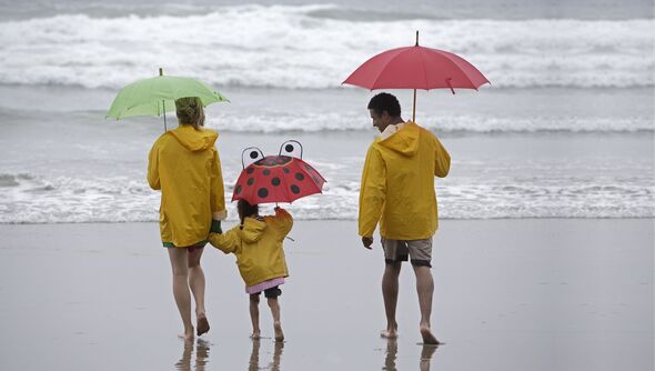 Family playing on beach