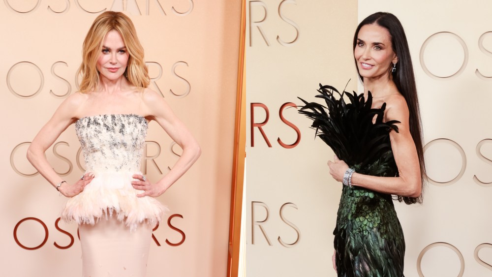 Nicole Kidman and Demi Moore wearing feathred dresses at the 98th Academy Awards in Los Angeles on March 15, 2026.