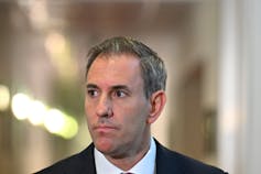 Treasurer Jim Chalmers speaks to journalists in the Press Gallery