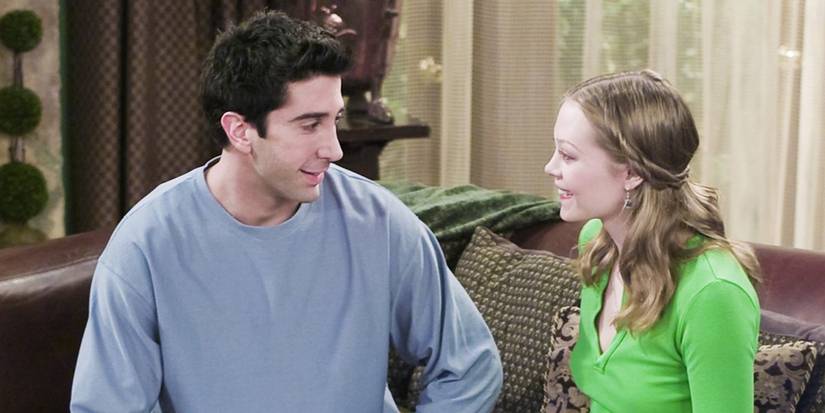 Ross and Elizabeth sitting on a couch in Friends