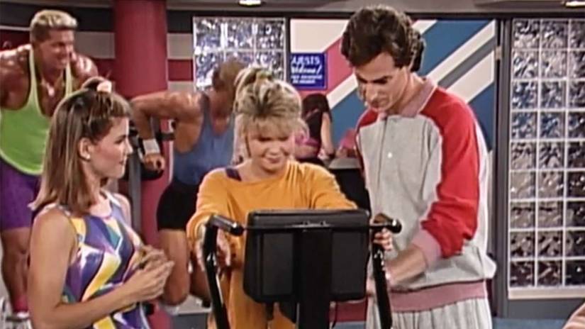 DJ works out on a treadmill next to her dad and Aunt Becky.