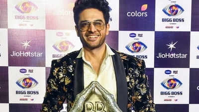 Bigg Boss Season 19 winner Gaurav Khanna poses with the trophy after the reality show's grand finale, in Mumbai. (PTI)