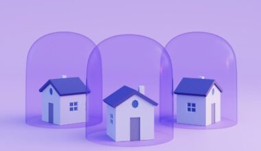 An image showing three digital designs of houses inside bubbles on a purple background