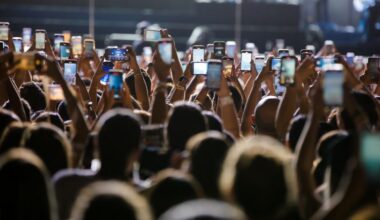 Concert crowds have become ‘a sea of phones.’ But is the tide turning?