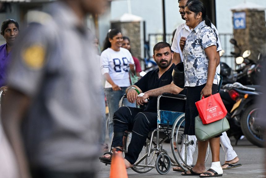 An injured Iranian sailor arrives to receive treatment at the Karapitiya hospital in Galle after his frigate, IRIS Dena sank off Sri Lanka's coast on March 4, 2026.
