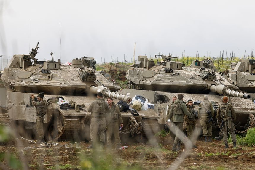 Israeli tanks gather in the upper Galilee near the border with Lebanon in northern Israel on March 7.