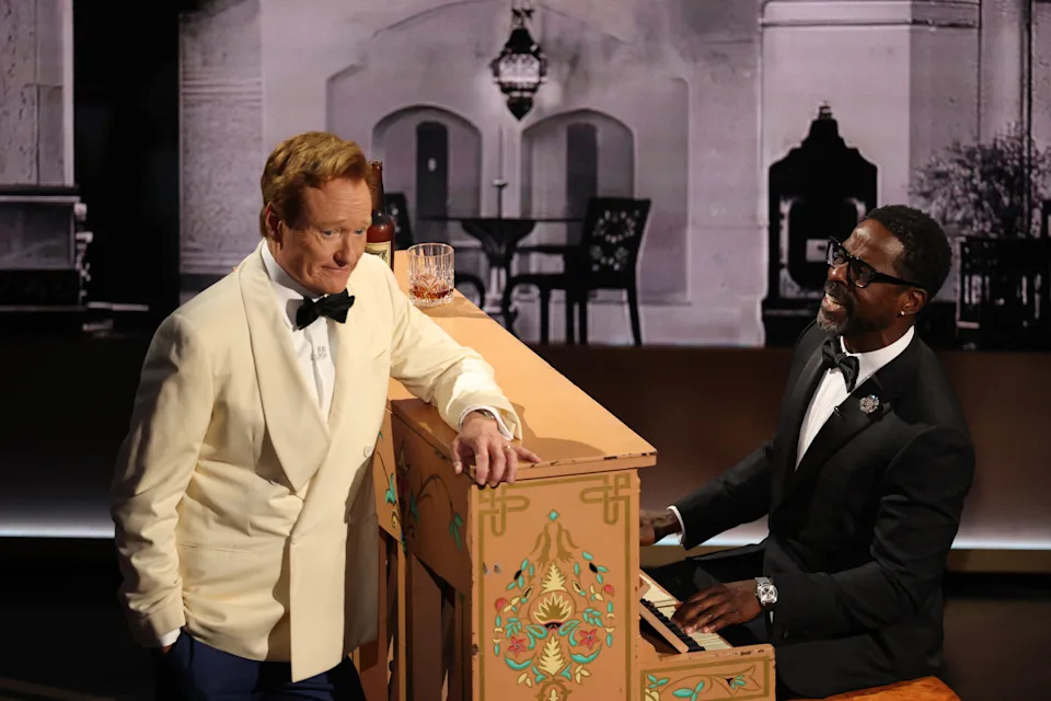 Host Conan O'Brien and speak Sterling K. Brown onstage during the 98th Annual Academy Awards.