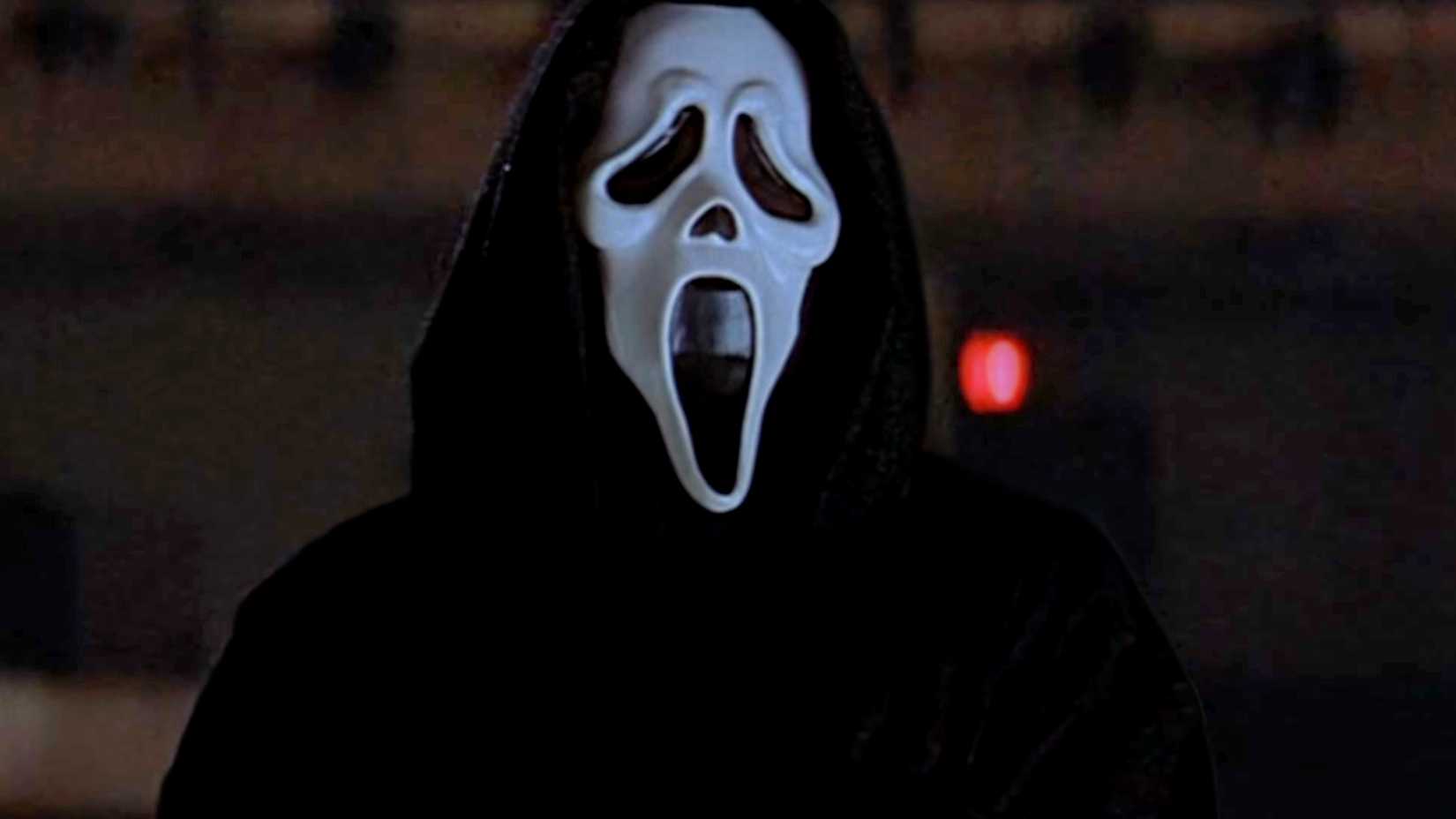 Ghostface standing in the theater in Scream 2
