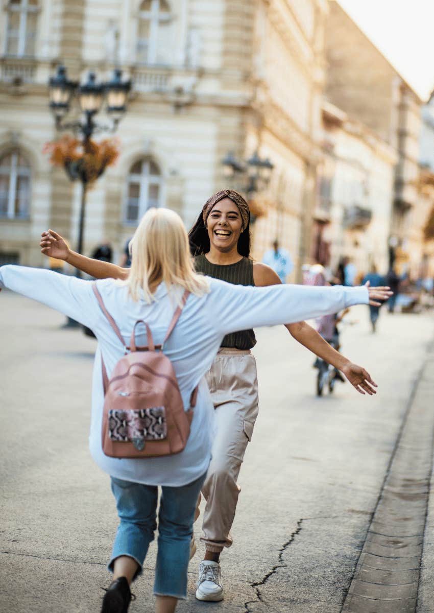 happy friends greeting each other