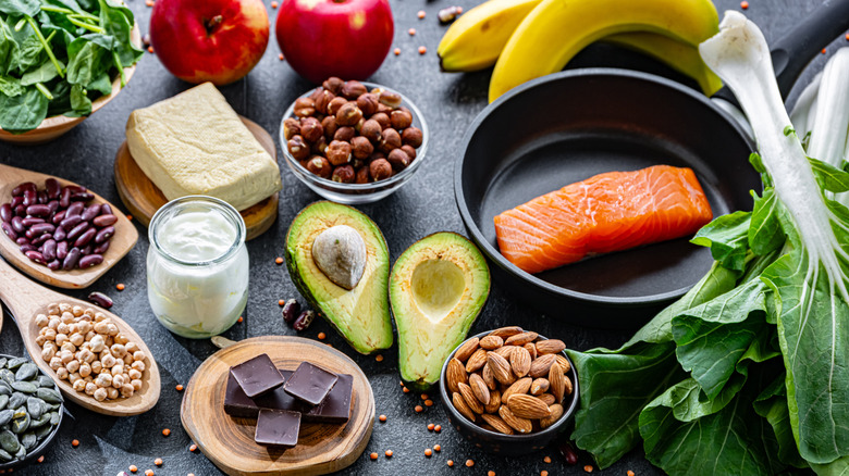 Spread of nuts, fruits, salmon, legumes, and vegetables