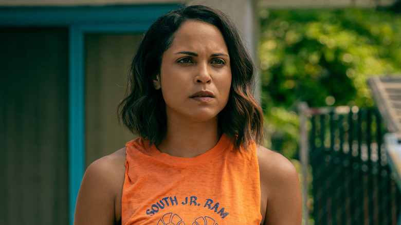 Jackie Quiñones (Monica Raymund) wearing orange tank top in Hightown