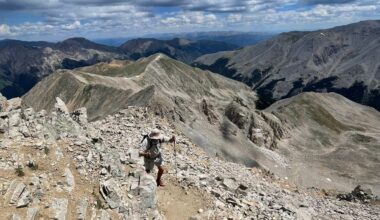 Hiker on talus-covered trail