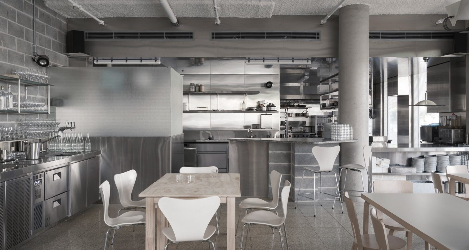 Kitchen with concrete and metal surfaces