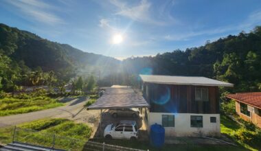 Intense sunlight and hot weather conditions in Sabah, Malaysia, illustrating the visible effects of an accelerating global warming rate.