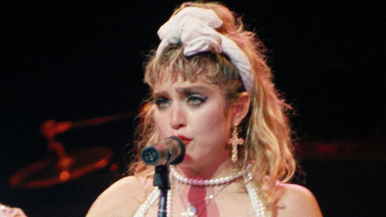 Madonna singing onstage in mid-1980s