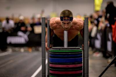 In 2024, Jake Dearden intensely pushes through a Hyrox fitness challenge in Cape Town, showcasing Red Bull's spirit of perseverance and athletic excellence