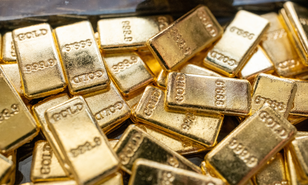 Gold clings to record highs as Iran conflict stokes safe-haven rush - Benefits and Pensions Monitor