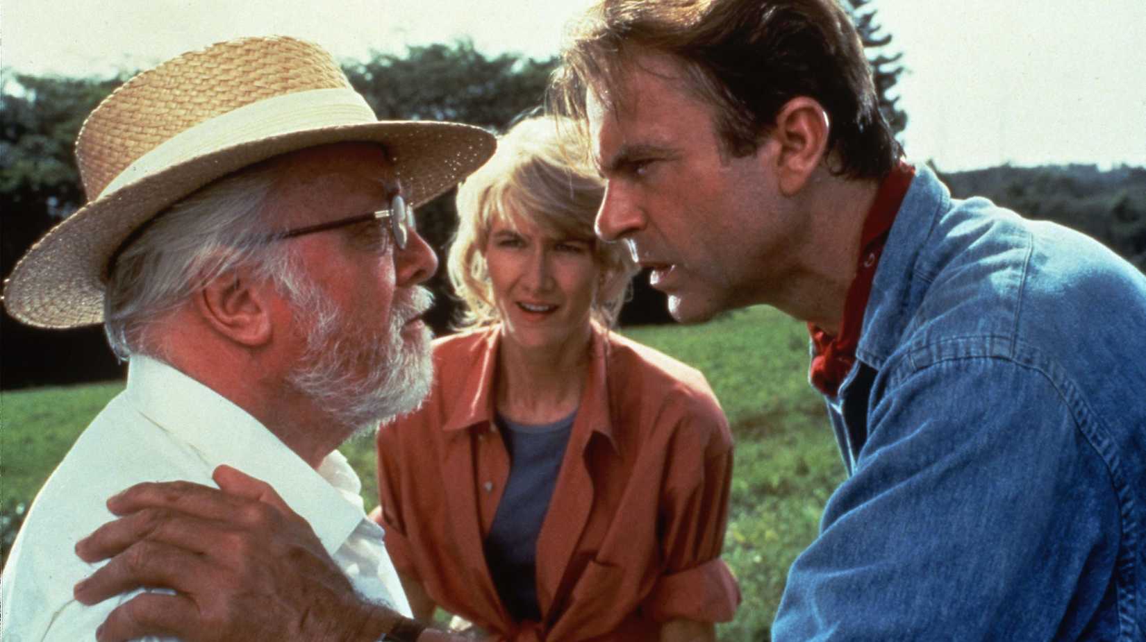 Richard Attenborough, Sam Neill and Laura Dern looking worried in Jurassic Park (1993)