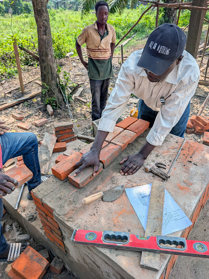kéré architecture shapes clinic across hillside in burundi to expand rural healthcare access - 7