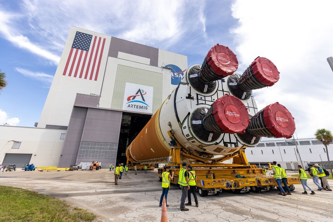 The core stage of the Space Launch System can be seen prior to being placed atop the mobile launcher.