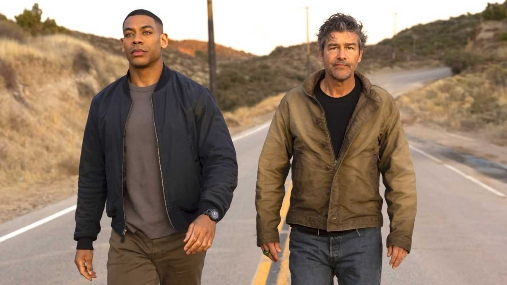Kyle Chandler and Aaron Pierre are walking in Lanterns TV Show