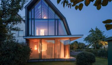 You’d Never Believe This Angular Glass Facade Stands Among Former Military Barracks