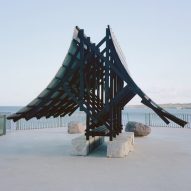Asympta pavilion with wood roof