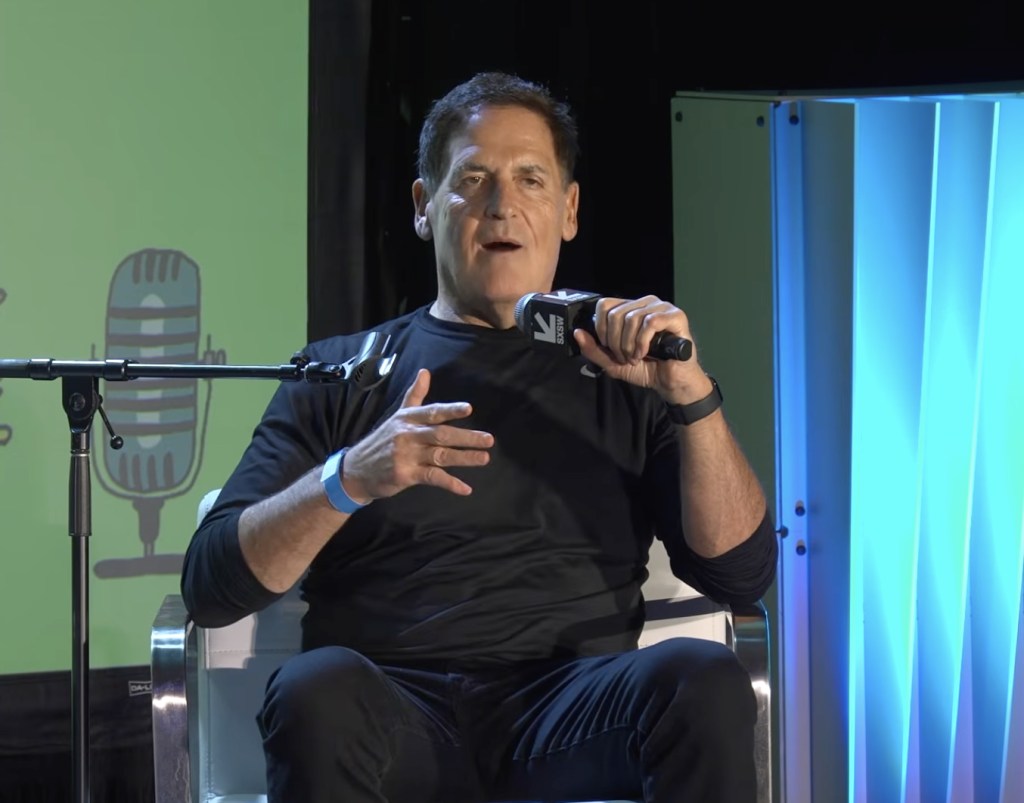 Mark Cuban speaking into a microphone at SXSW.