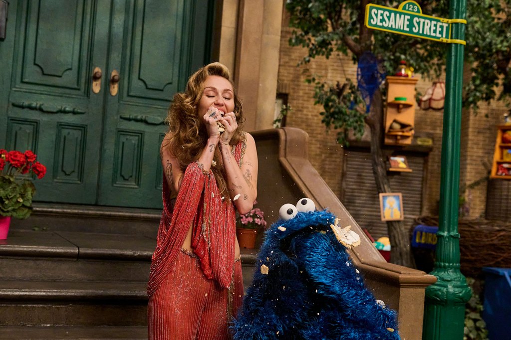 Miley Cyrus Gets a 'Flower' From Cookie Monster on 'Sesame Street'
